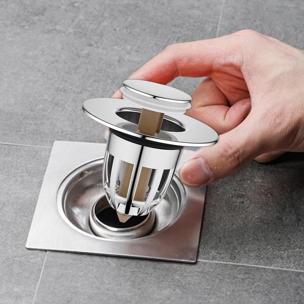 TAPPO DI SCARICO PER LAVANDINO BAGNO FILTRO IN ACCIAIO A PRESSIONE COPRI SCARICO in Tappi Trade Shop italia - Napoli, commercioVirtuoso.it