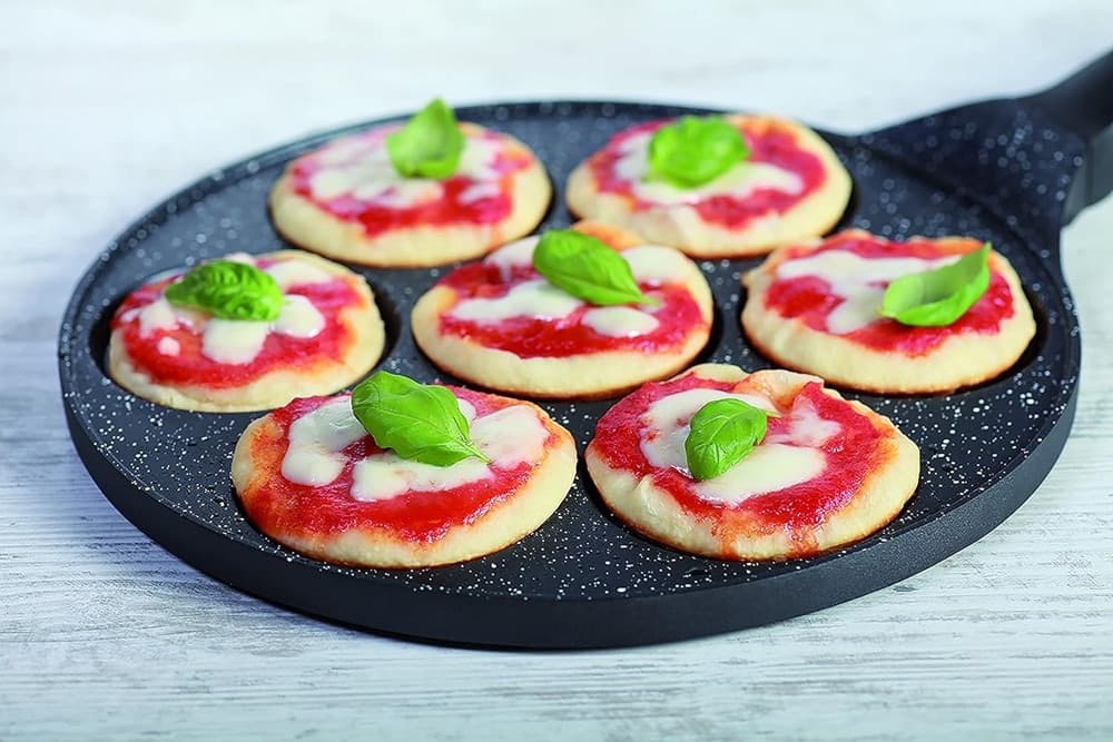 PADELLA MULTIFUNZIONE PER PANCAKE FRITTELLE NERO A 7 FORI STAMPI ANTIADERENTE 62432 in Padelle universali Trade Shop italia - Napoli, commercioVirtuoso.it