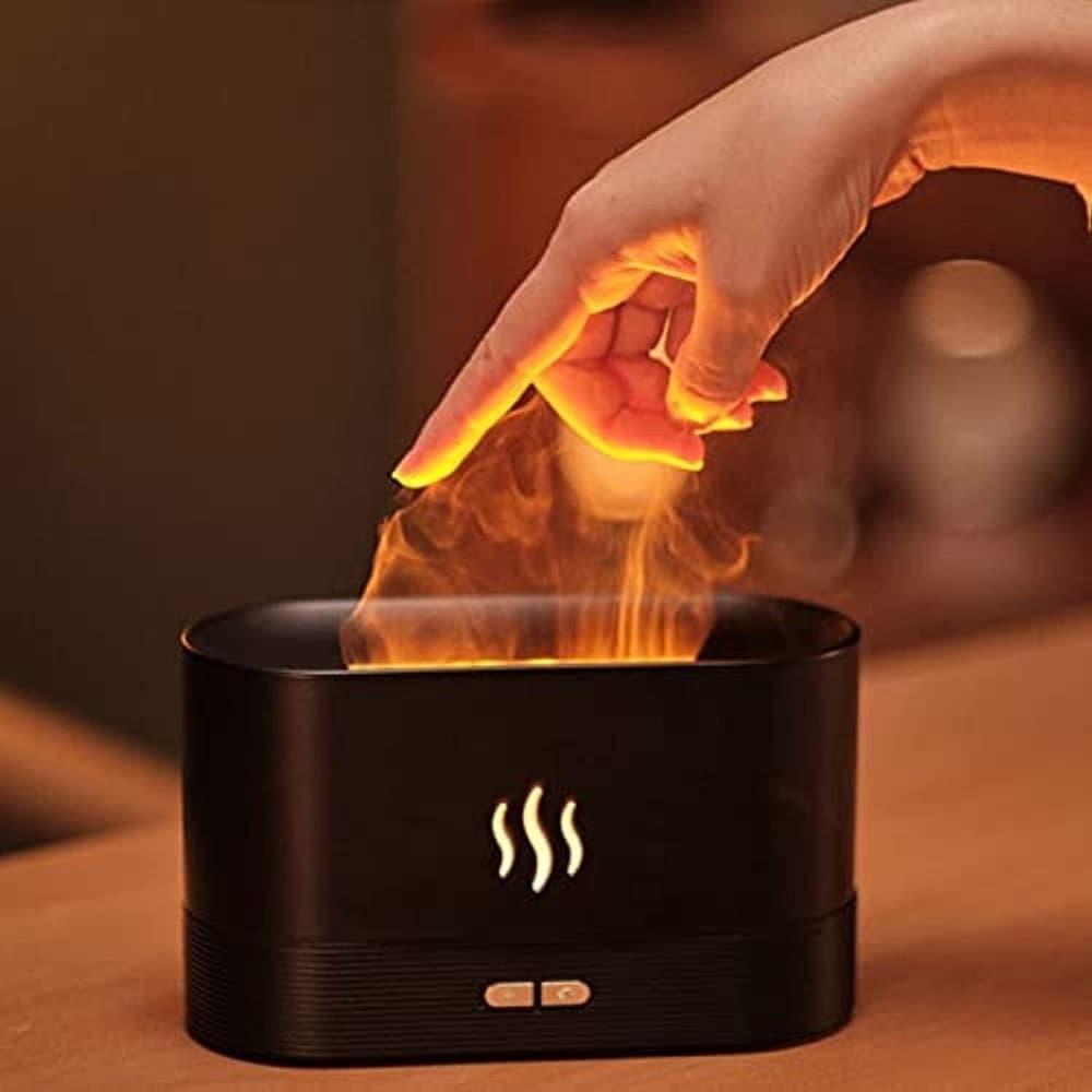 DIFFUSORE UMIDIFICATORE A NEBBIA LUCE EFFETTO FIAMMA SUPER SILENZIOSO PER CAMERA UFFICIO in Accessori per la profumazione della casa Trade Shop italia - Napoli, commercioVirtuoso.it