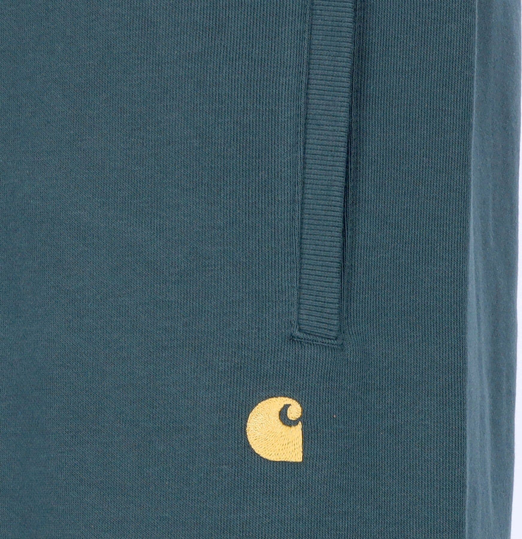 CARHARTT WIP Pantalone Tuta Felpato Uomo Chase Sweat Pant Juniper/gold da uomo in Pantaloni sportivi Drestige - Casamassima, commercioVirtuoso.it