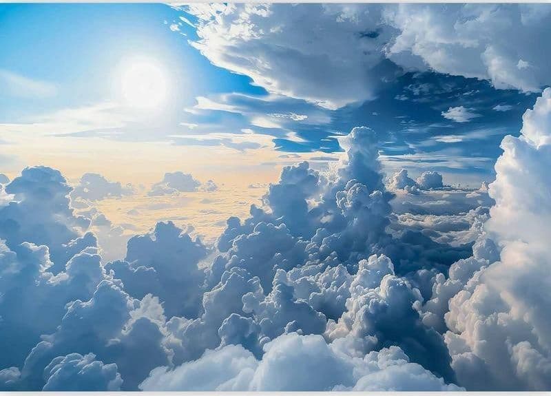 Carta da parati - Symphony of Light: Sun and Clouds Collaborating on a Beautiful Sky in Carta da parati Collezione Casa - Trebisacce, commercioVirtuoso.it