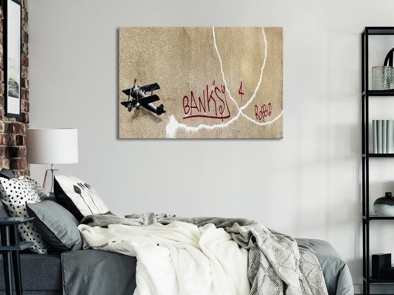 Quadro - Banksys Plane (1-part) - Red Graffiti Text on Mural Background in Poster e stampe Collezione Casa - Trebisacce, commercioVirtuoso.it