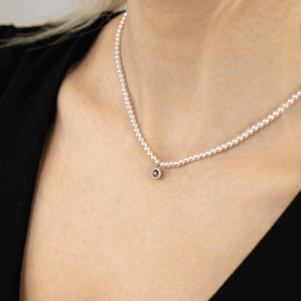 BOCCADAMO -  Collana di perle con fiore di zirconi rosso rubino centrale in Collane Alba Gioielli - Casoria, commercioVirtuoso.it