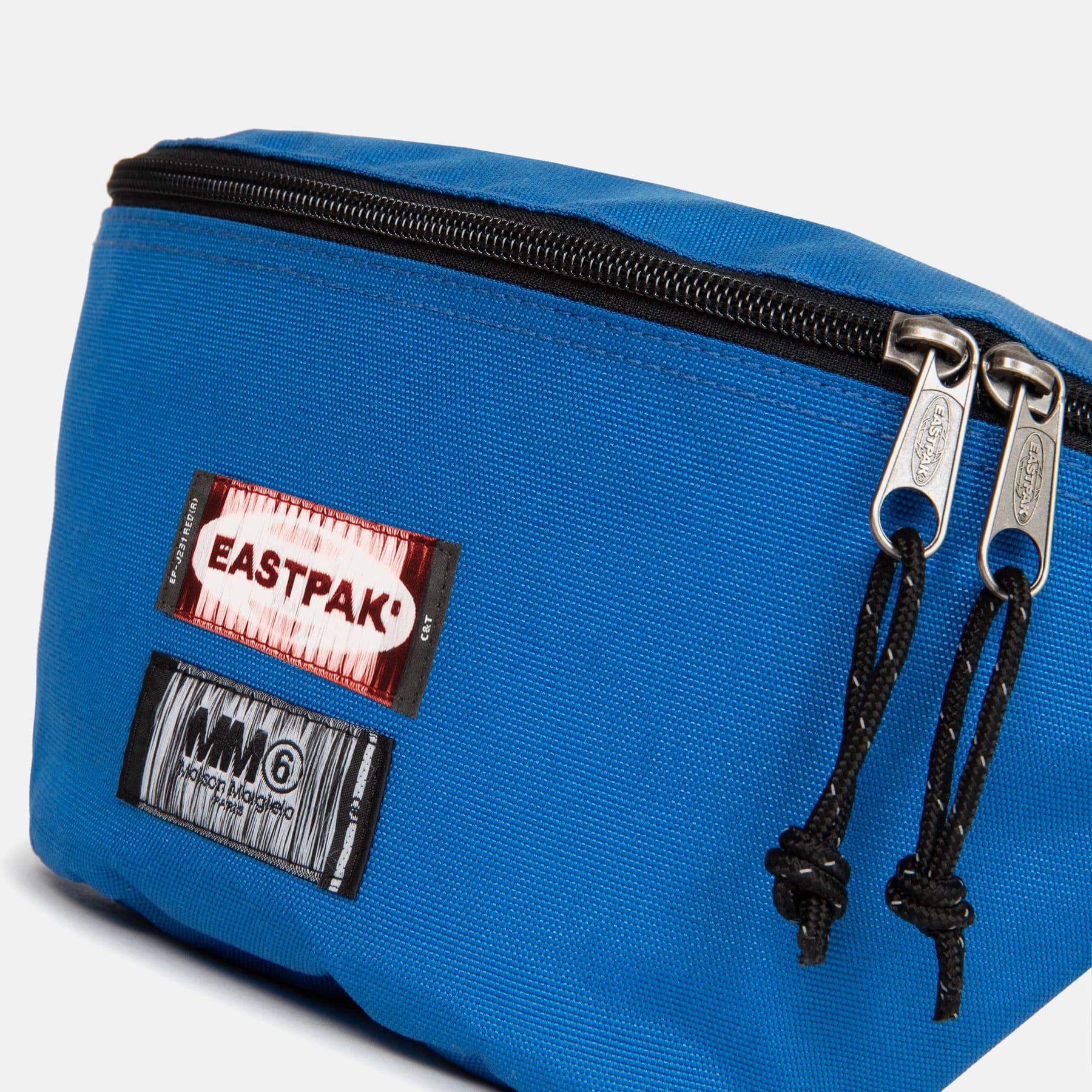 EASTPAK Marsupio Springer MM6 Blue White Reversible da uomo in Marsupi alla moda Drestige - Casamassima, commercioVirtuoso.it