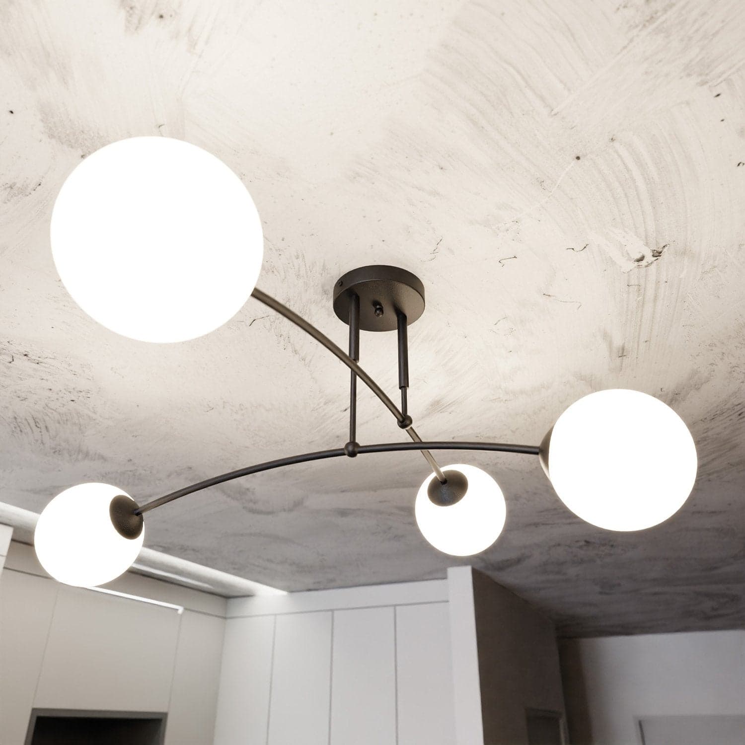 Plafoniera Moderna 4 Luci Pregos In Acciaio Nero E Vetri A Sfera In Bianco in Plafoniere LuceArt - Montecorvino Pugliano, commercioVirtuoso.it