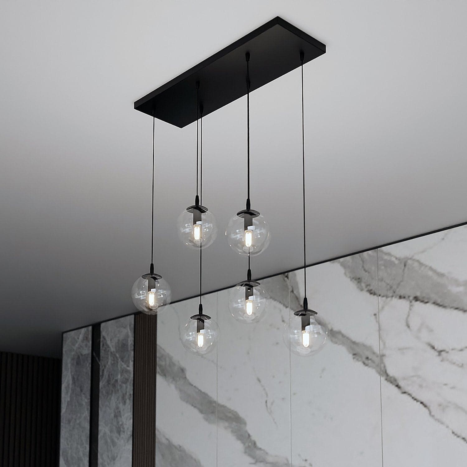 Sospensione Moderna 6 Luci Cosmo In Acciaio Nero E Sfere In Vetro Trasparente in Lampade a sospensione LuceArt - Montecorvino Pugliano, commercioVirtuoso.it