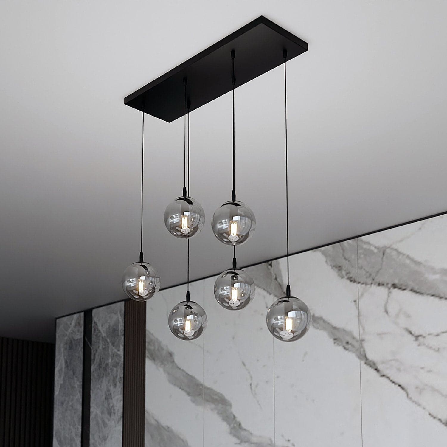 Sospensione Moderna 6 Luci Cosmo In Acciaio Nero E Sfere In Vetro Fumè in Lampade a sospensione LuceArt - Montecorvino Pugliano, commercioVirtuoso.it