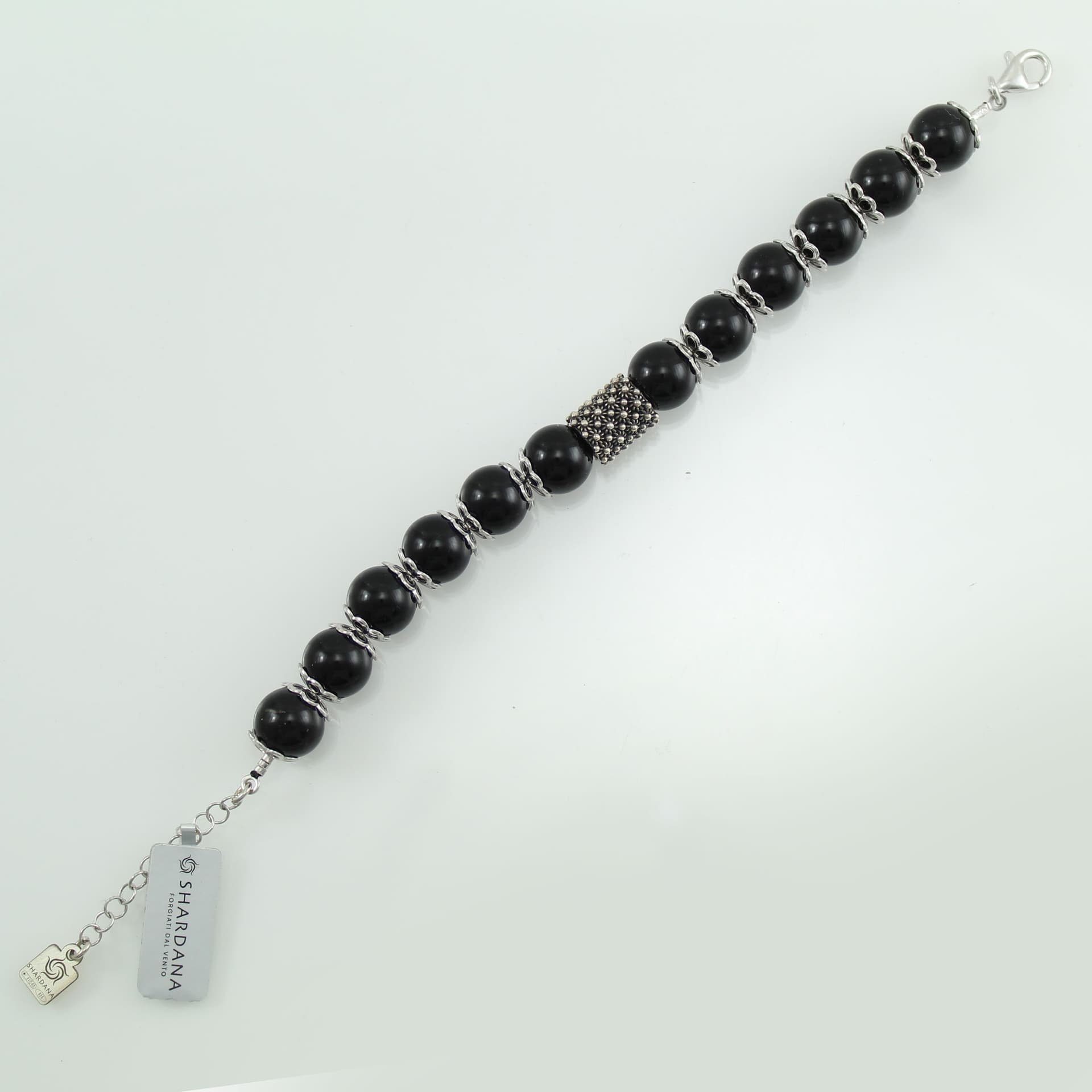 Bracciale portafortuna Su Coccu sfere onice e filigrana d'argento in Bracciali Gioielleria Saba - Dolianova, commercioVirtuoso.it