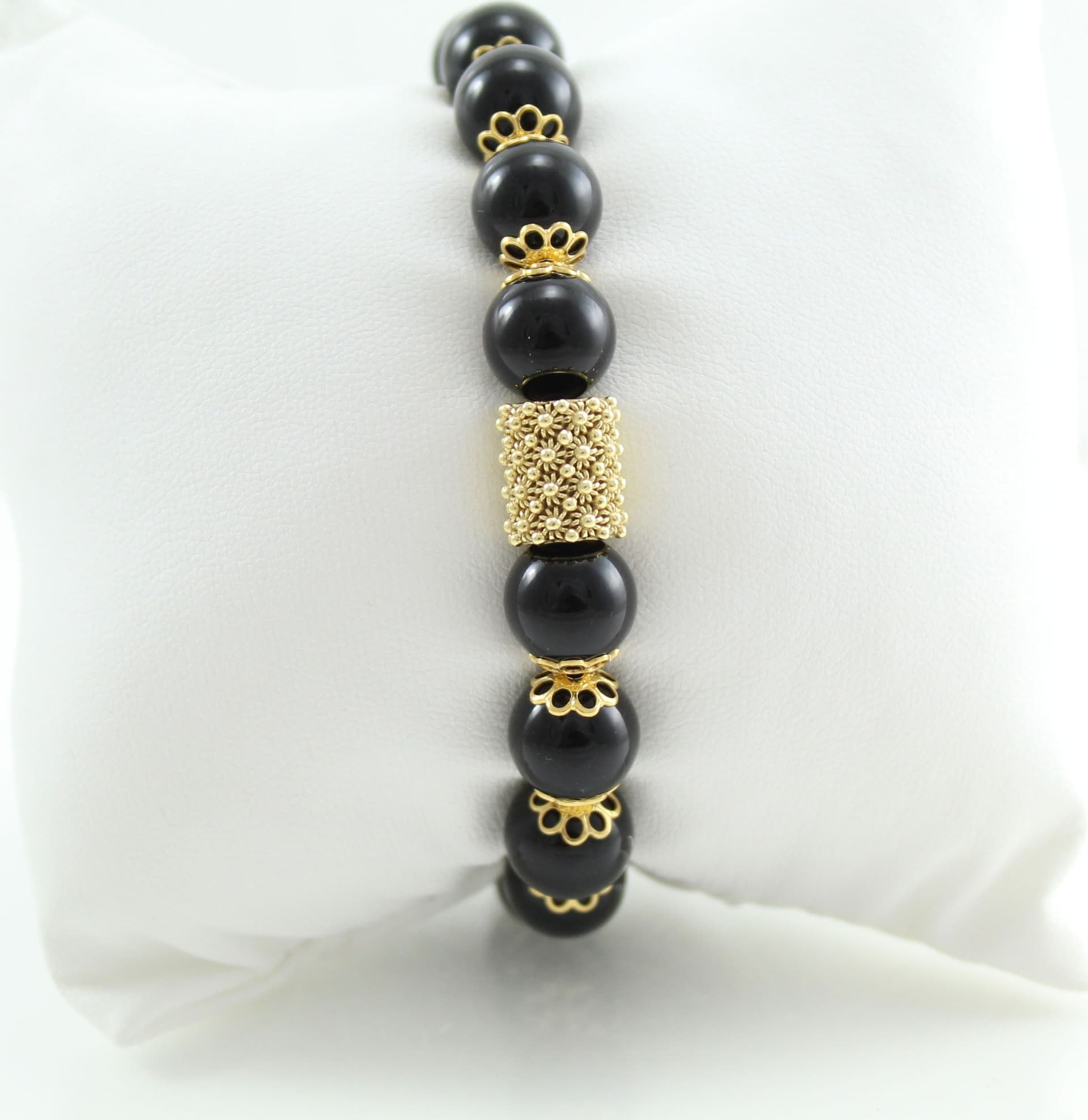 Bracciale portafortuna Su Coccu sfere onice e filigrana d'argento dorato in Bracciali Gioielleria Saba - Dolianova, commercioVirtuoso.it