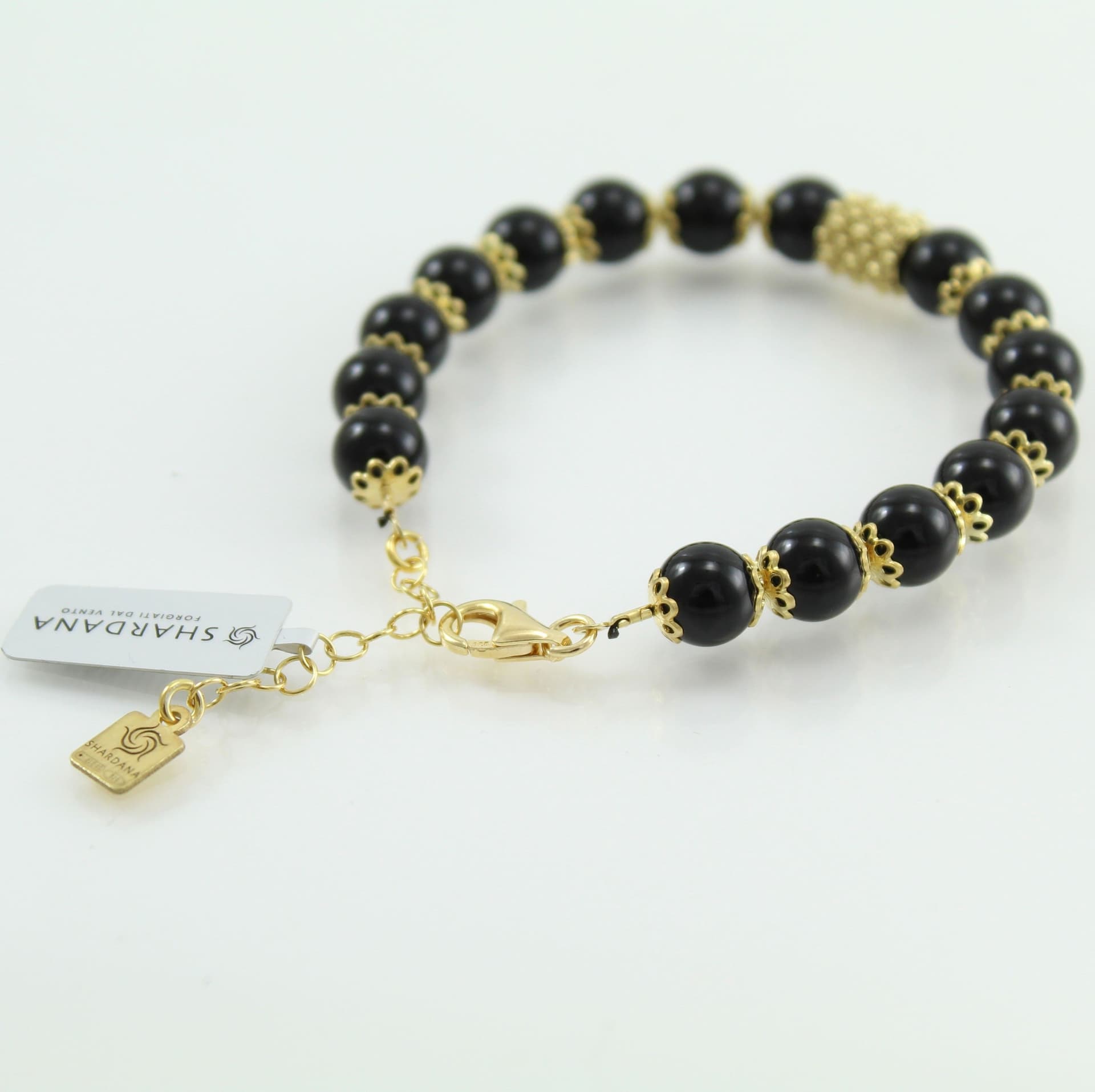 Bracciale portafortuna Su Coccu sfere onice e filigrana d'argento dorato 8 mm in Bracciali Gioielleria Saba - Dolianova, commercioVirtuoso.it
