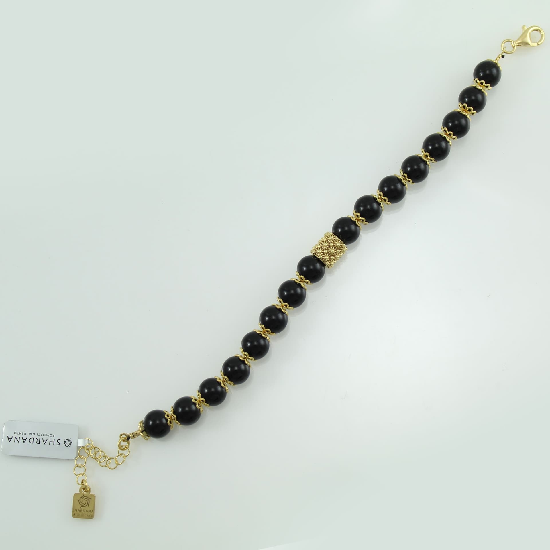 Bracciale portafortuna Su Coccu sfere onice e filigrana d'argento dorato 8 mm in Bracciali Gioielleria Saba - Dolianova, commercioVirtuoso.it