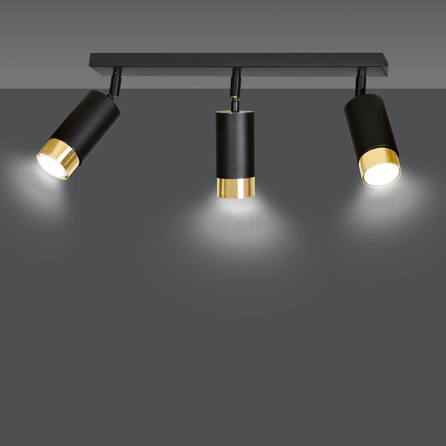 Plafoniera 3 Luci A Faretti Orientabili A Cilindro In Acciaio Nero E Oro in Faretti da soffitto LuceArt - Montecorvino Pugliano, commercioVirtuoso.it