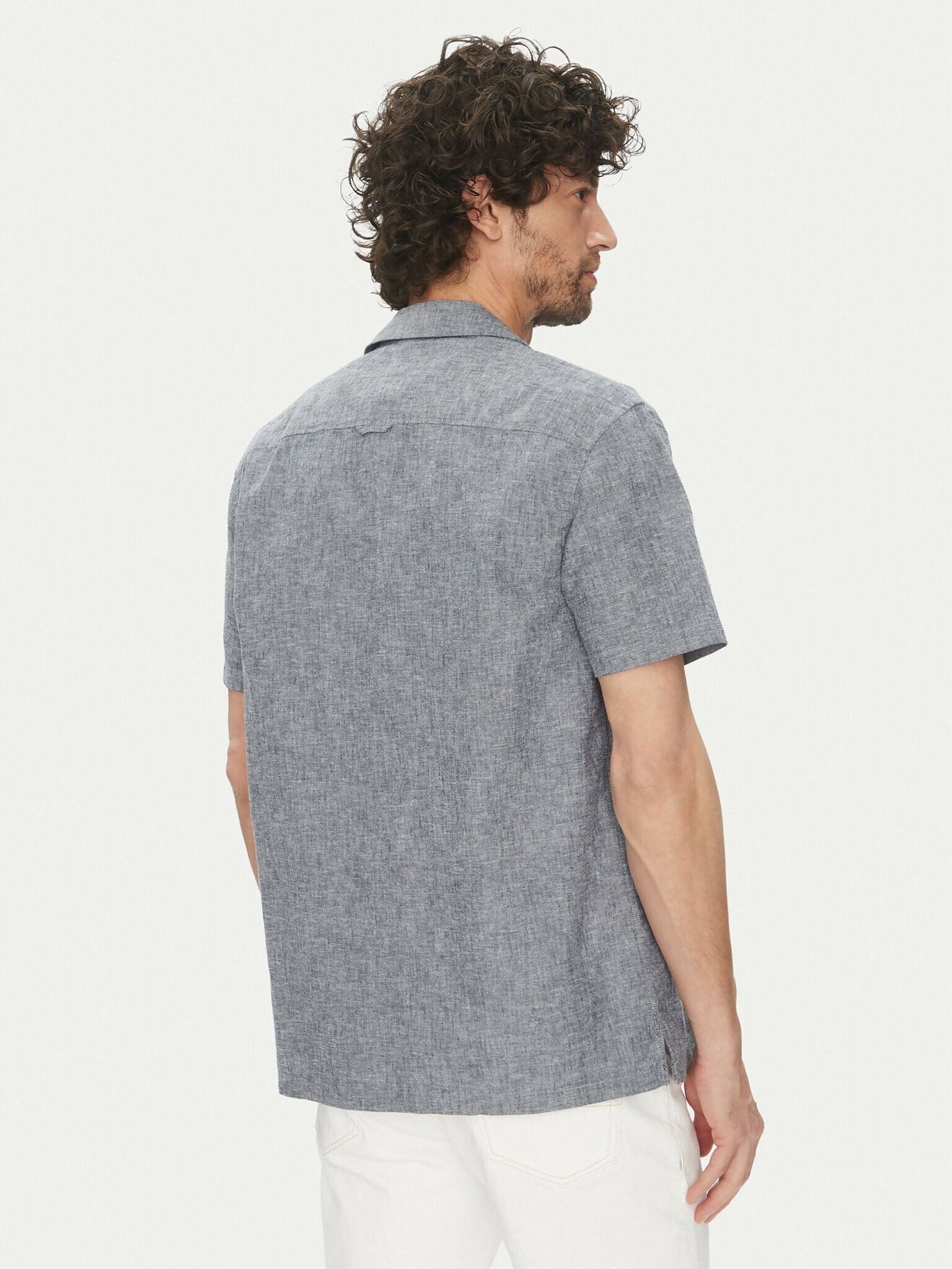 Camica per uomo della Tommy Jeans, a maniche corte, materiale cotone biologico e lino in Camicie casual Loweconomy - Marineo, commercioVirtuoso.it