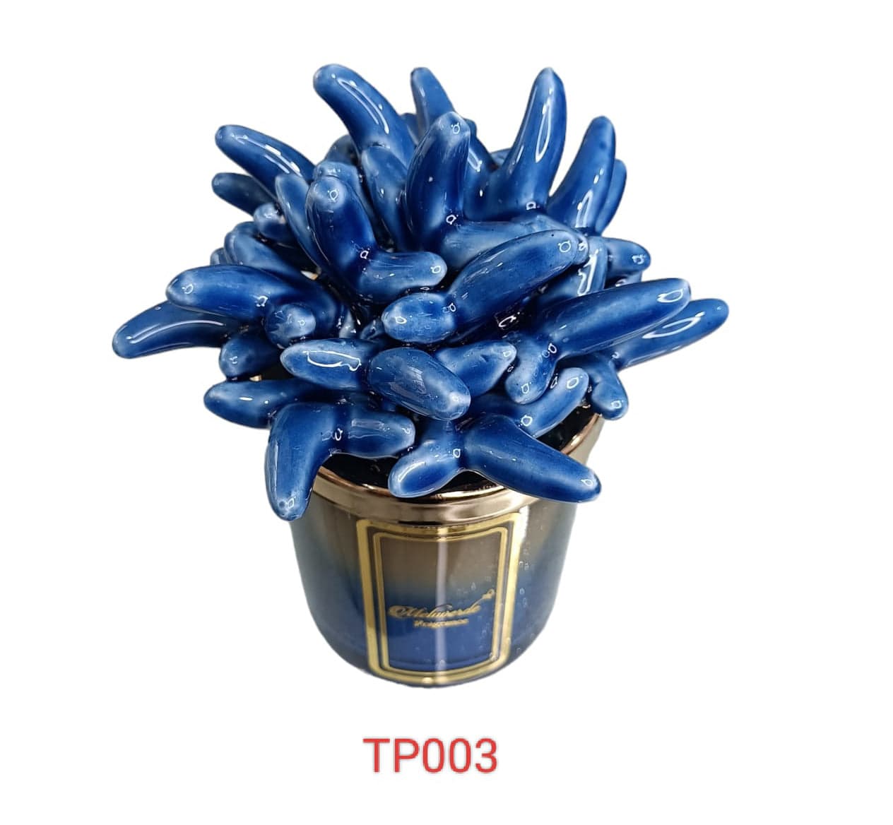 Candela media in ceramica bicolore blu anemone Melaverde Linea Tropicana da 200gr, decorata a mano, con scatola regalo raffinata.