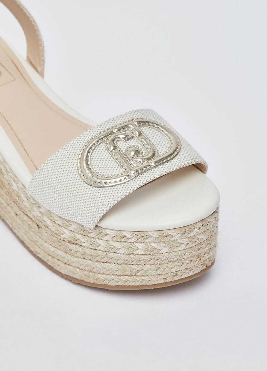 Liujo Donna Sandali zeppa con logo monogram in Sandali moda Cantali Calzature - Randazzo, commercioVirtuoso.it