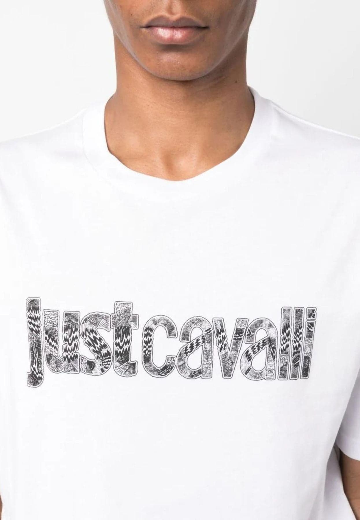 JUST CAVALLI T-SHIRT LOGO KNITT da uomo in T-shirt Drestige - Casamassima, commercioVirtuoso.it