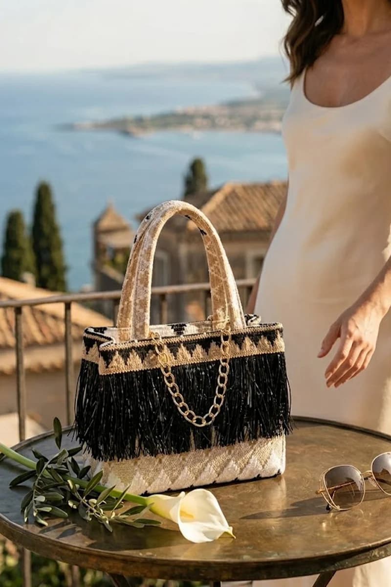 Borsa a mano fantasia con frange e catenina | PHO Firenze in prodotto You Store - Messina, commercioVirtuoso.it