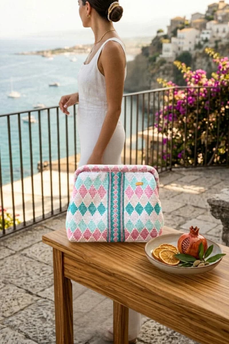 Maxi pochette fantasia rombi e chiusura a scatto | PHO Firenze in prodotto You Store - Messina, commercioVirtuoso.it