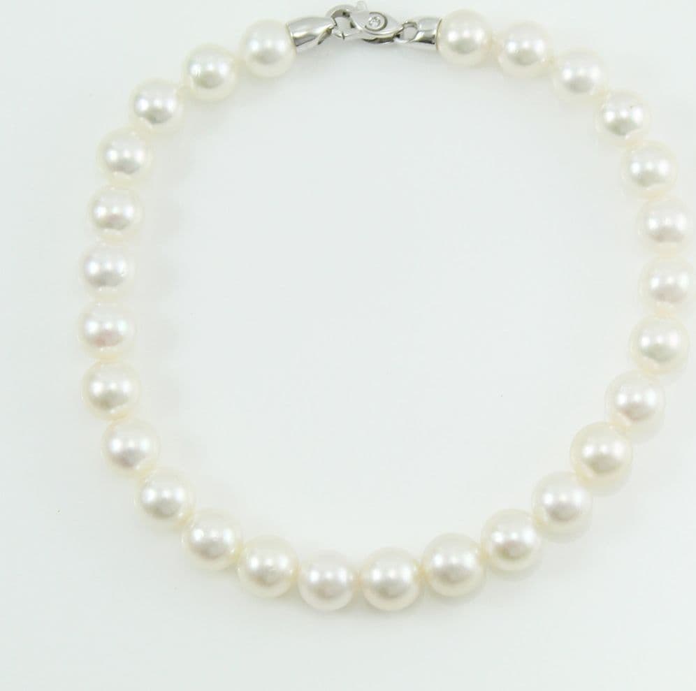 Bracciale donna perle Akoya 6,5/7 chiusura oro bianco con diamante Coscia in Bracciali Gioielleria Saba - Dolianova, commercioVirtuoso.it
