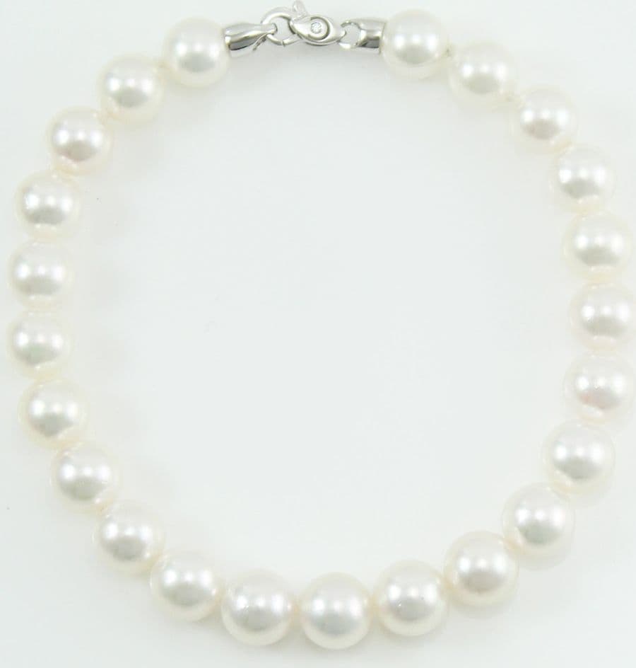 Bracciale donna perle Akoya 7,5/8 chiusura oro bianco con diamante Coscia in Bracciali Gioielleria Saba - Dolianova, commercioVirtuoso.it