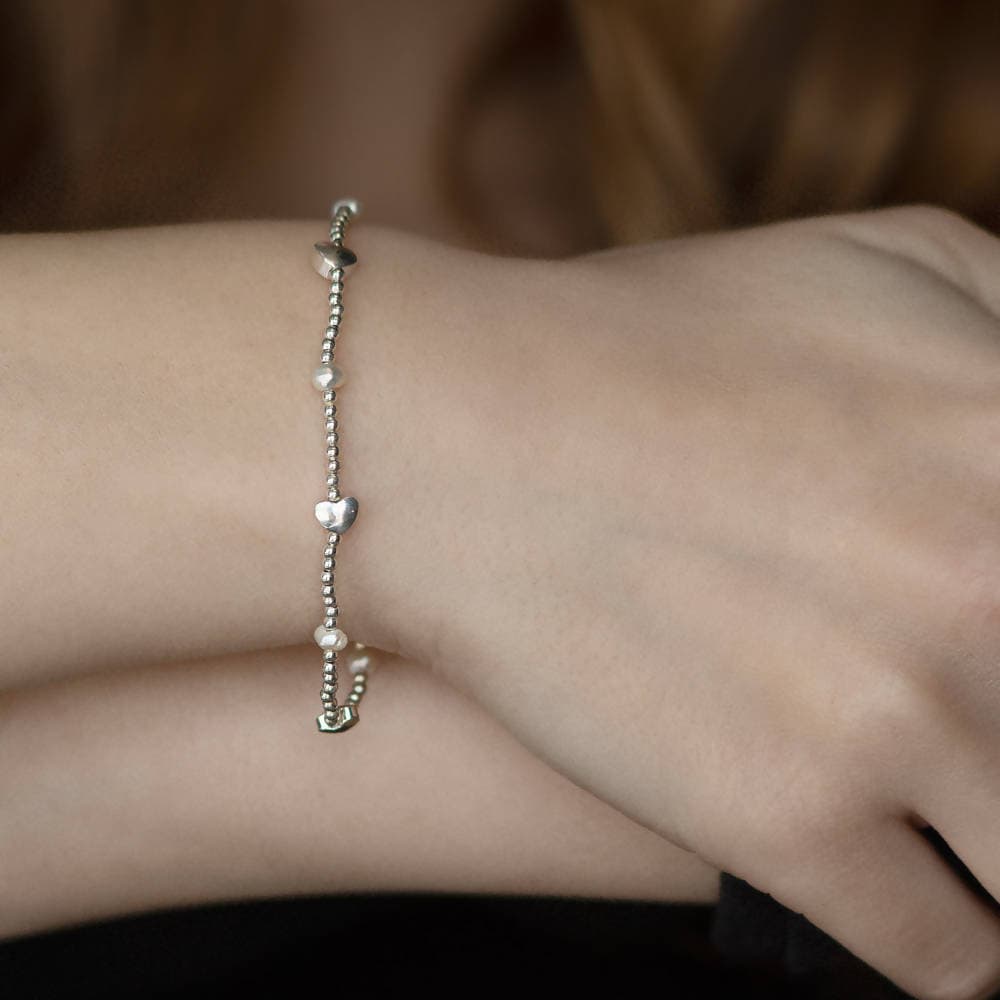 Bracciale Elastico Donna cuore/perla Braccialetto sottile Argentato nickel tested Regalo per Lei Vestopazzo in Bracciali CliV - Milazzo, commercioVirtuoso.it