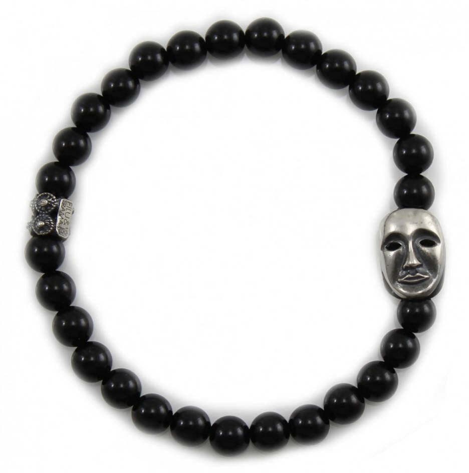 Bracciale elastico con sfere in onice e maschera della sartiglia in argento in Bracciali Gioielleria Saba - Dolianova, commercioVirtuoso.it