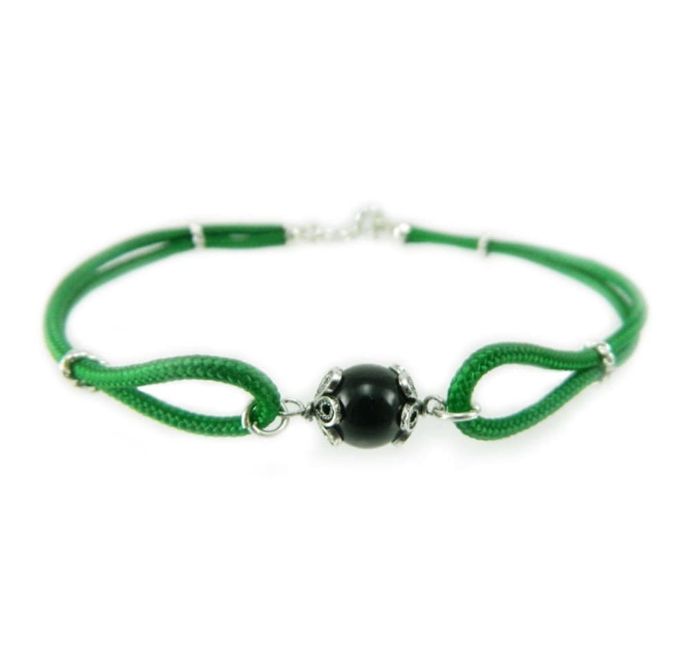 Bracciale uomo portafortuna sardo verde e ciondolo su coccu in Bracciali Gioielleria Saba - Dolianova, commercioVirtuoso.it