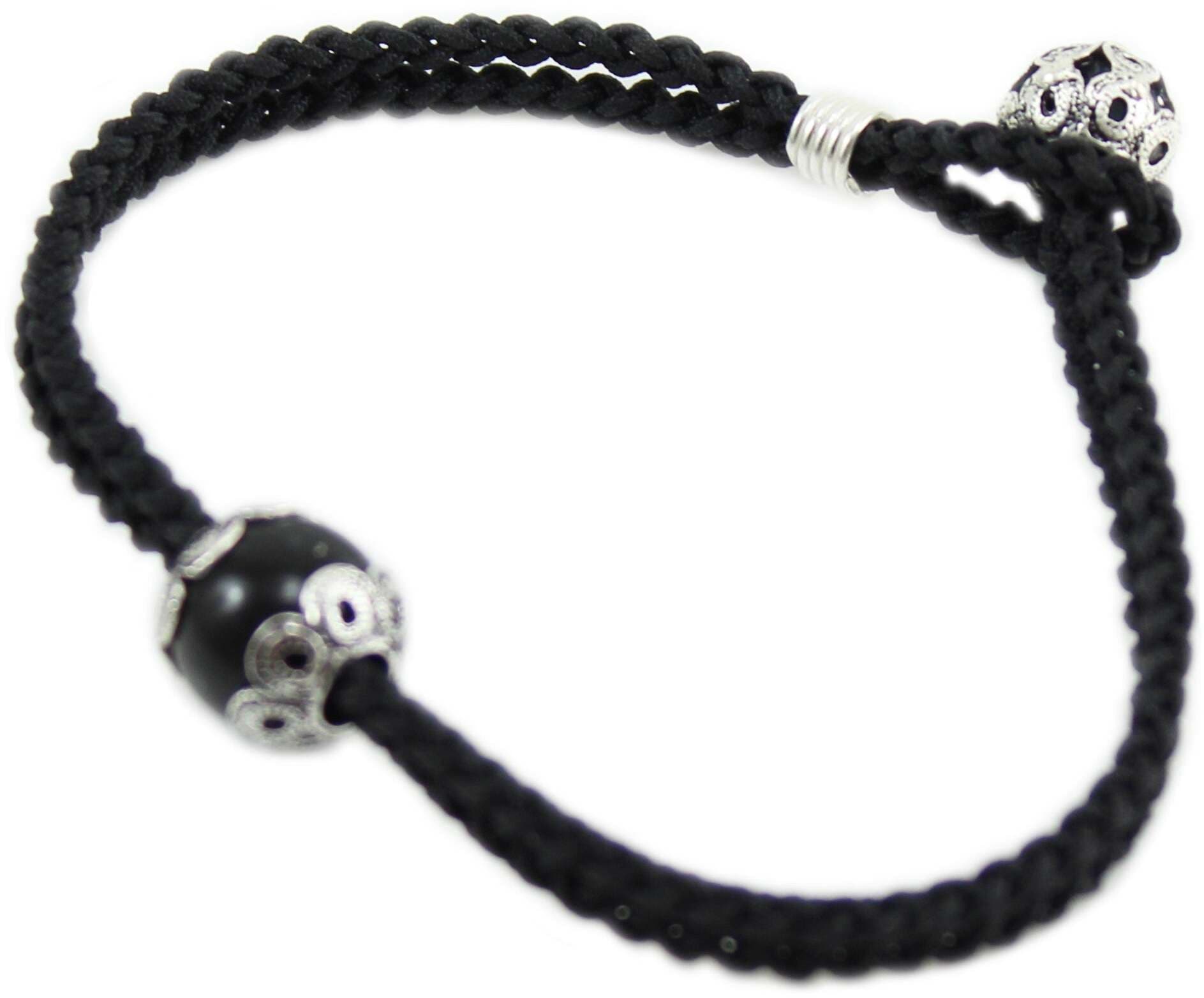 Bracciale sagola nera uomo con centrale su coccu e bottone argento in Bracciali Gioielleria Saba - Dolianova, commercioVirtuoso.it