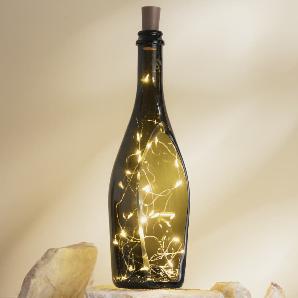 Lampada a bottiglia in vetro riciclato e di design | lampada ecosostenibile in Lampadari Amarzo - Colle di Val d’Elsa, commercioVirtuoso.it