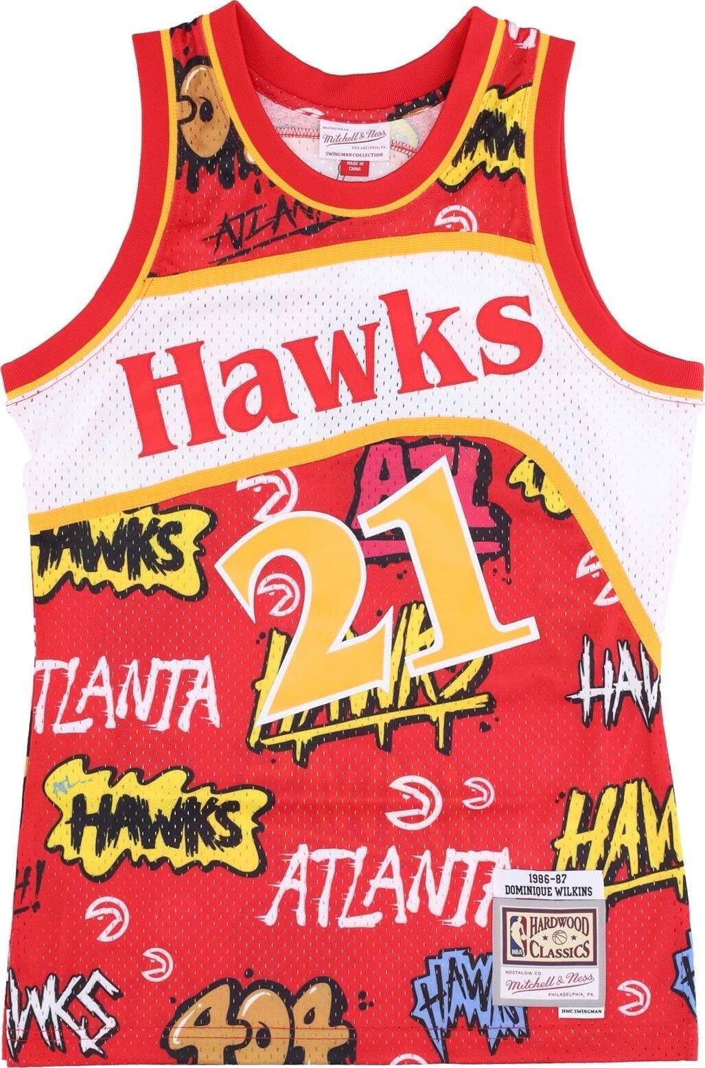 MITCHELL-&-NESS-Canotta-Basket-Uomo-Nba-Slap-Sticker-Swingman-Jersey-Hardwood-Classics-No-21-Dominique-Wilkins-1986-87-Atlhaw-Red-da-uomo
