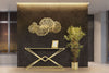 Console Piramid struttura in ferro color oro e vetro per interni