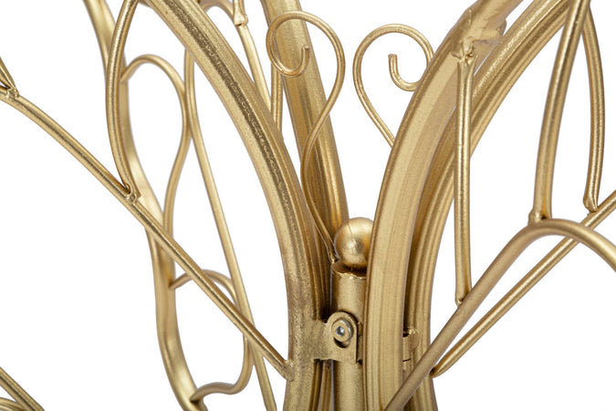 Console struttura forma farfalla in metallo color oro e ripiano in vetro per interni