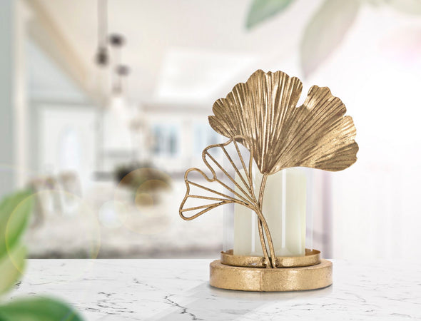 Porta candela struttura in metallo color oro con foglie per interni