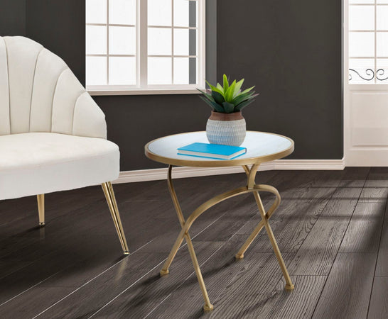 Tavolinetto tondo struttura in metallo color oro ripiano in vetro per interni