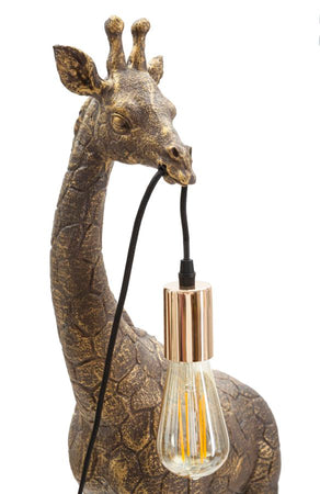 Lampada da tavolo "Giraffa" struttura in poliresina color oro antico per interni