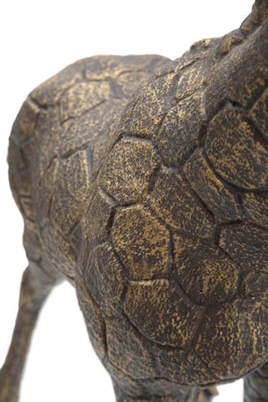 Lampada da tavolo "Giraffa" struttura in poliresina color oro antico per interni