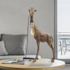 Lampada da tavolo Giraffa struttura in poliresina color oro antico per interni