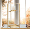 Porta candela con struttura in metallo color oro per interni