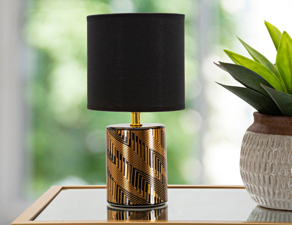Lampada da tavolo struttura in ceramica color oro e nero per interni