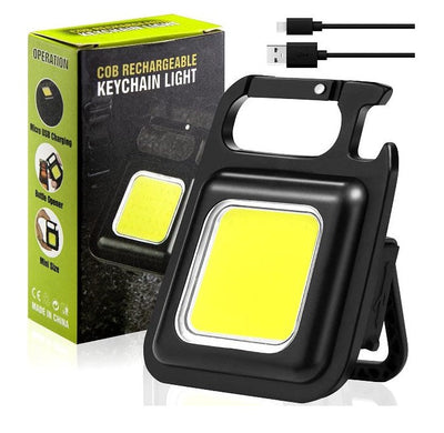 TORCIA MINI PORTACHIAVI RICARICABILE IMPERMEABILE - LUCE TASCABILE CON STAFFA PIEGHEVOLE APRIBOTTIGLIE E BASE MAGNETICA (COB KEYCHAIN PM-50)