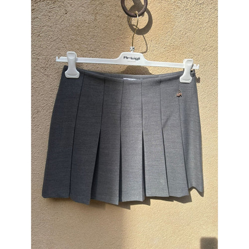 Gonna corta a pieghe