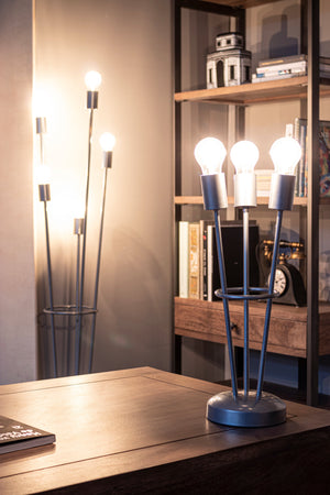 Lampada da tavolo "Fiaccola" a 3 luci in acciaio