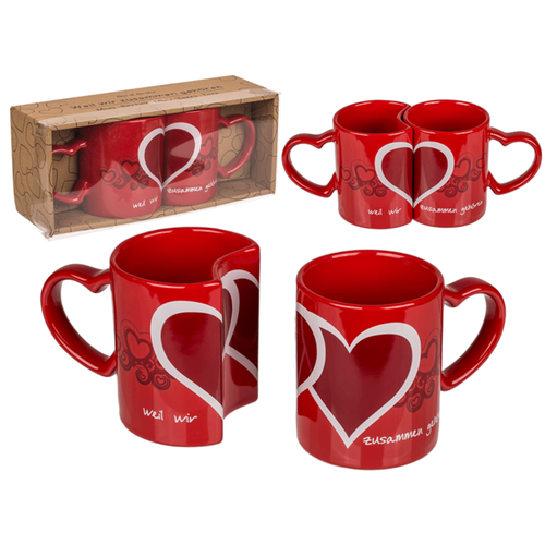 due tazze rosse a incastro con cuore per coppia di innamorati