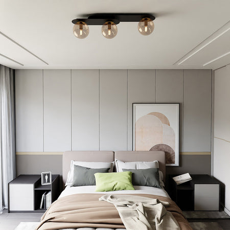 Plafoniera Minimal 3 Luci Plaza In Acciaio Nero E Sfere Vetro Ambra