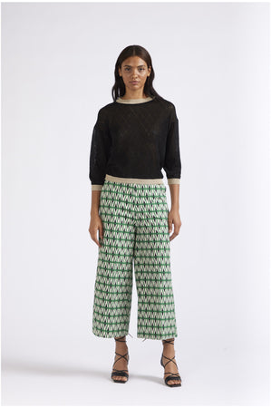 MAGLIA GIROCOLLO CON LUREX MOTIVO TRAFORO