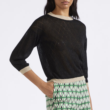 MAGLIA GIROCOLLO CON LUREX MOTIVO TRAFORO