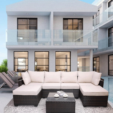 Set Divano Modulabile da Giardino in Polyrattan Cuscini Sfoderabili Beige Tavolino