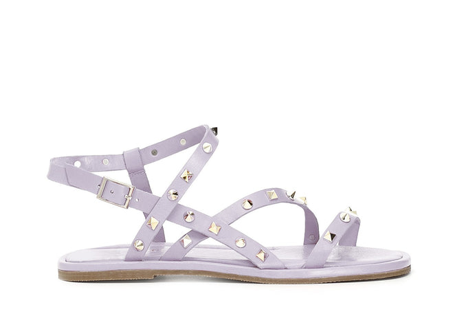 SANDALO IN PELLE INCROCIO CON BORCHIE