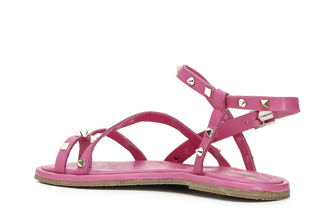 SANDALO IN PELLE INCROCIO CON BORCHIE