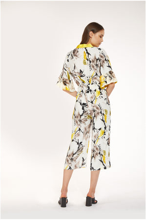 TUTA CON SCOLLO INCROCIATO